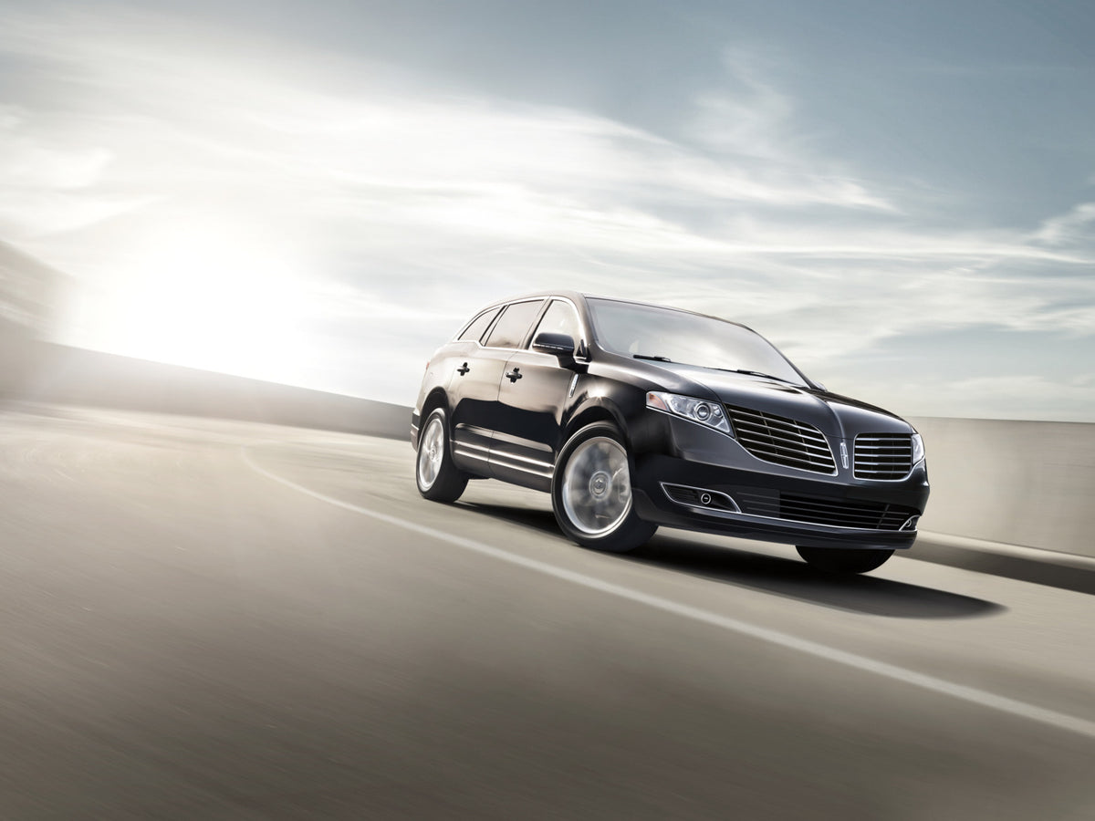 This archival image documents the 2017 Lincoln MKT action shot on road MS200015 and is preserved in the Ford Heritage Vault as part of Ford Motor Company's historic photographic archive. Free for personal, non-commercial use. Ford Heritage Vault r...