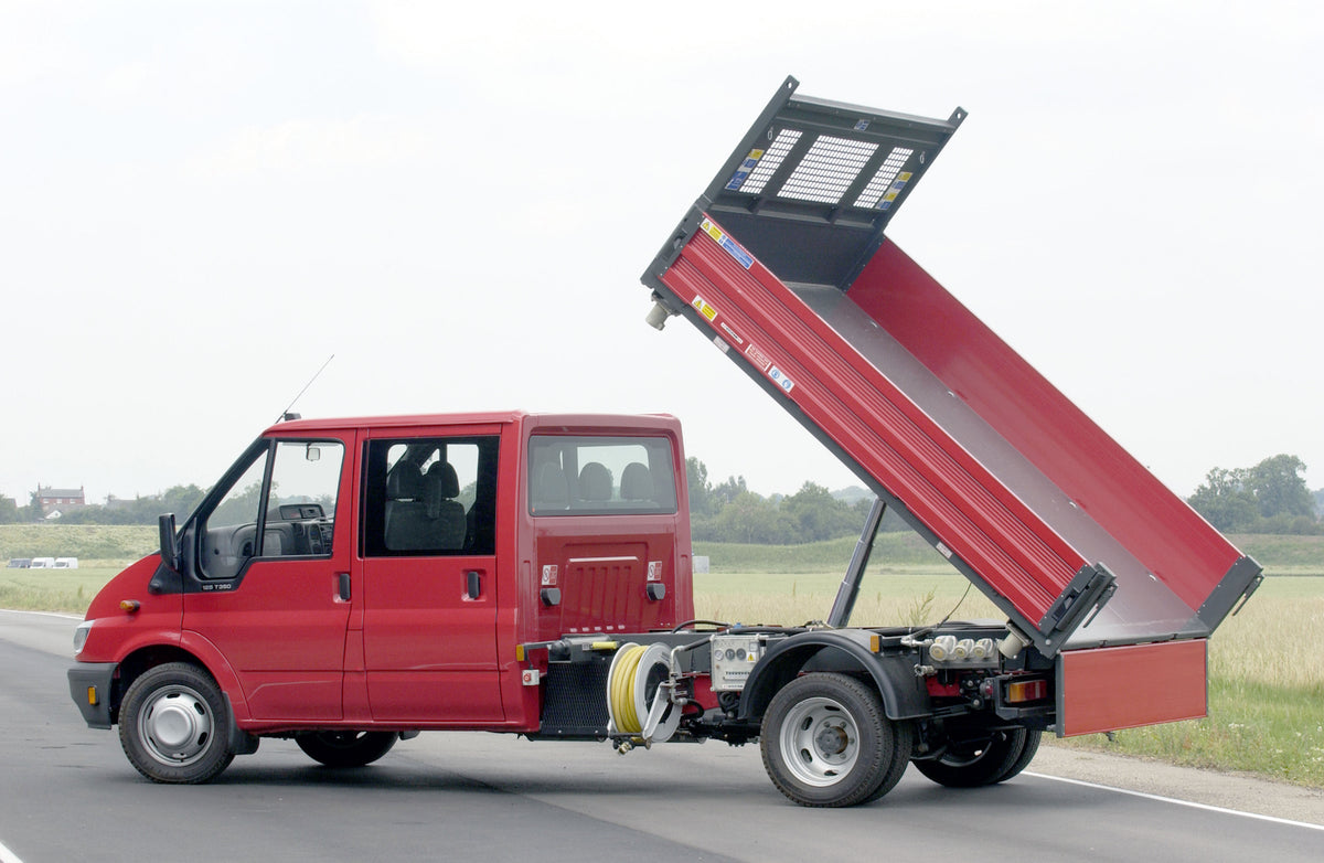 This archival image documents the 2003 Ford Transit Mark IV conversion rear view on scenic road and is preserved in the Ford Heritage Vault as part of Ford Motor Company's historic photographic archive. Free for personal, non-commercial use. Ford ...