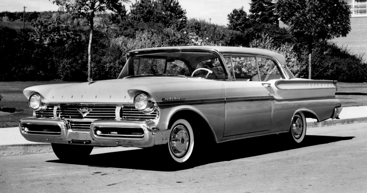 This archival image documents the 1957 Monarch Richelieu Coupe on scenic road with trees AR-2007-5 and is preserved in the Ford Heritage Vault as part of Ford Motor Company's historic photographic archive. Free for personal, non-commercial use. Fo...