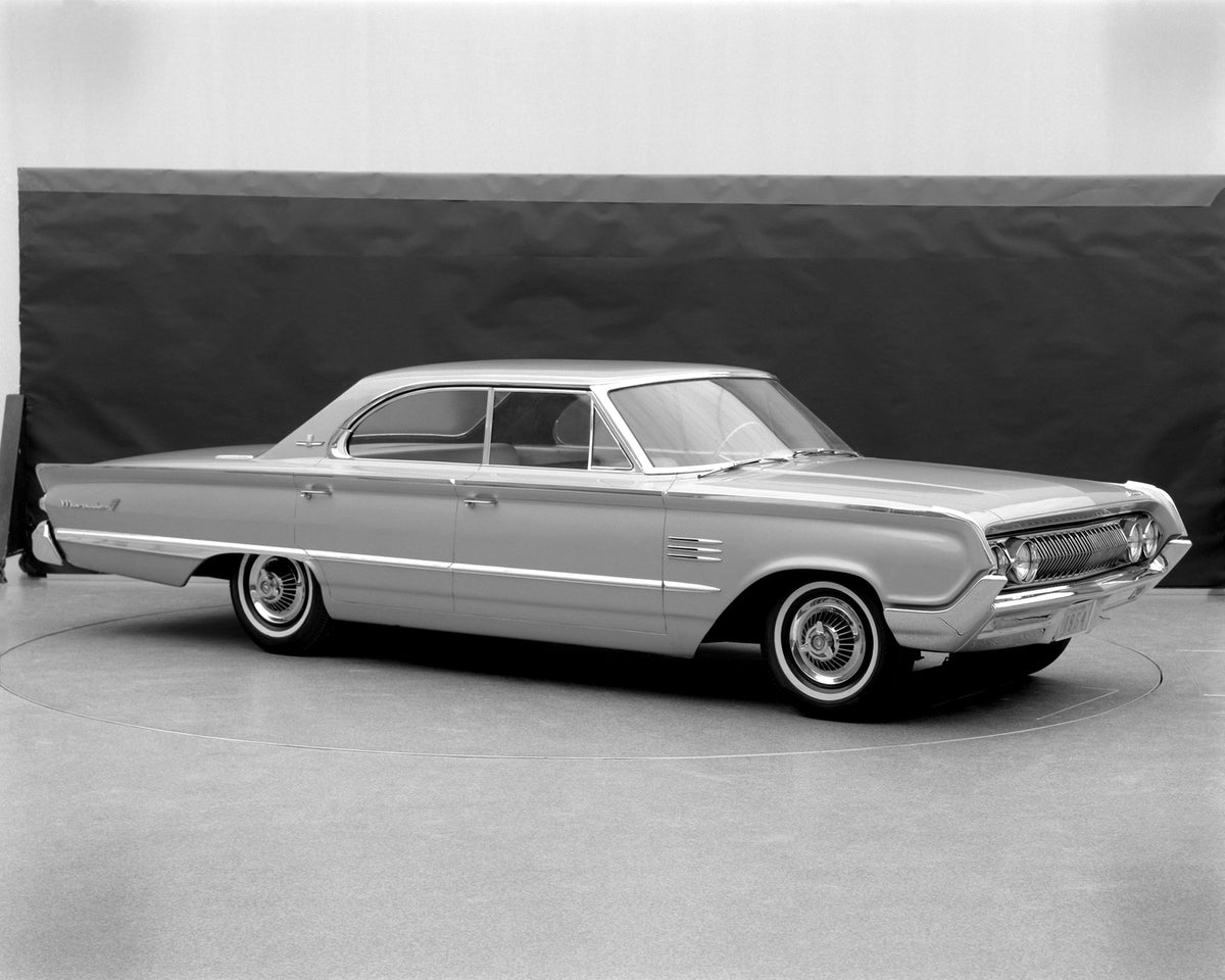 This archival image documents the 1964 Mercury Marauder Four-Door Hardtop and is preserved in the Ford Heritage Vault as part of Ford Motor Company's historic photographic archive. Free for personal, non-commercial use. Ford Heritage Vault referen...