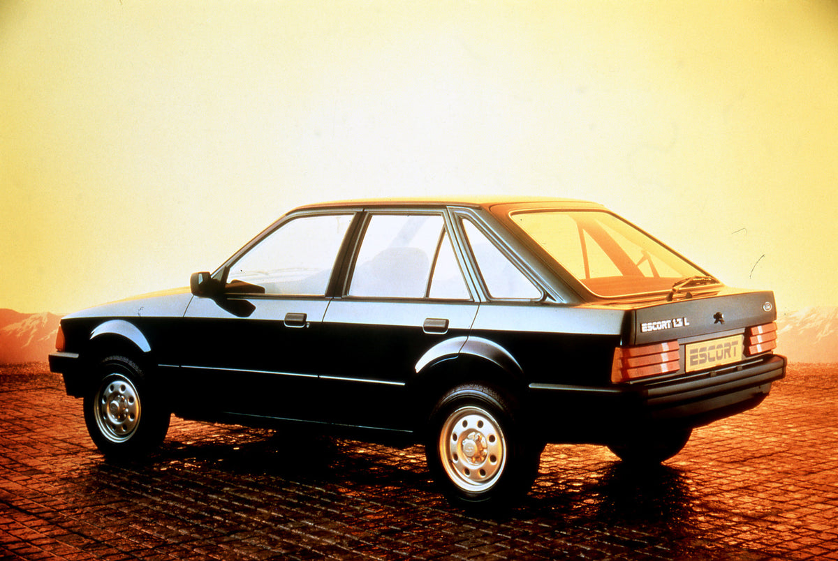 This archival image documents the 1983 Ford Escort Mark III 1.3 L in studio with scenic set and is preserved in the Ford Heritage Vault as part of Ford Motor Company's historic photographic archive. Free for personal, non-commercial use. Ford Heri...