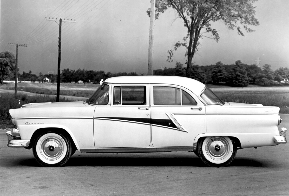 This archival image documents the 1955 Meteor Rideau Sedan side view on scenic road AR-2007-5 and is preserved in the Ford Heritage Vault as part of Ford Motor Company's historic photographic archive. Free for personal, non-commercial use. Ford He...