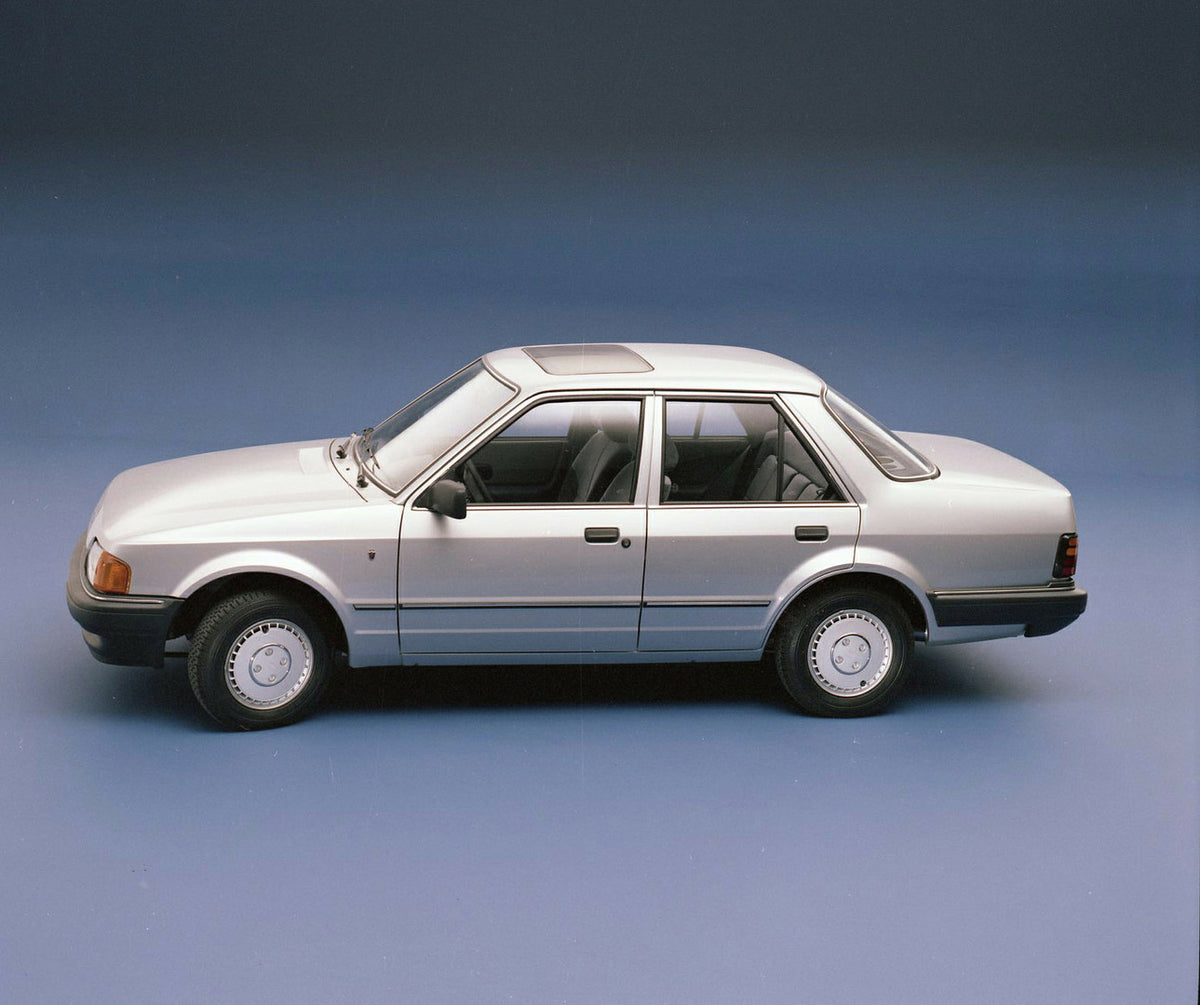 This archival image documents the 1986 Ford Orion Mark II 1.6 Ghia LHD side view in studio and is preserved in the Ford Heritage Vault as part of Ford Motor Company's historic photographic archive. Free for personal, non-commercial use. Ford Herit...