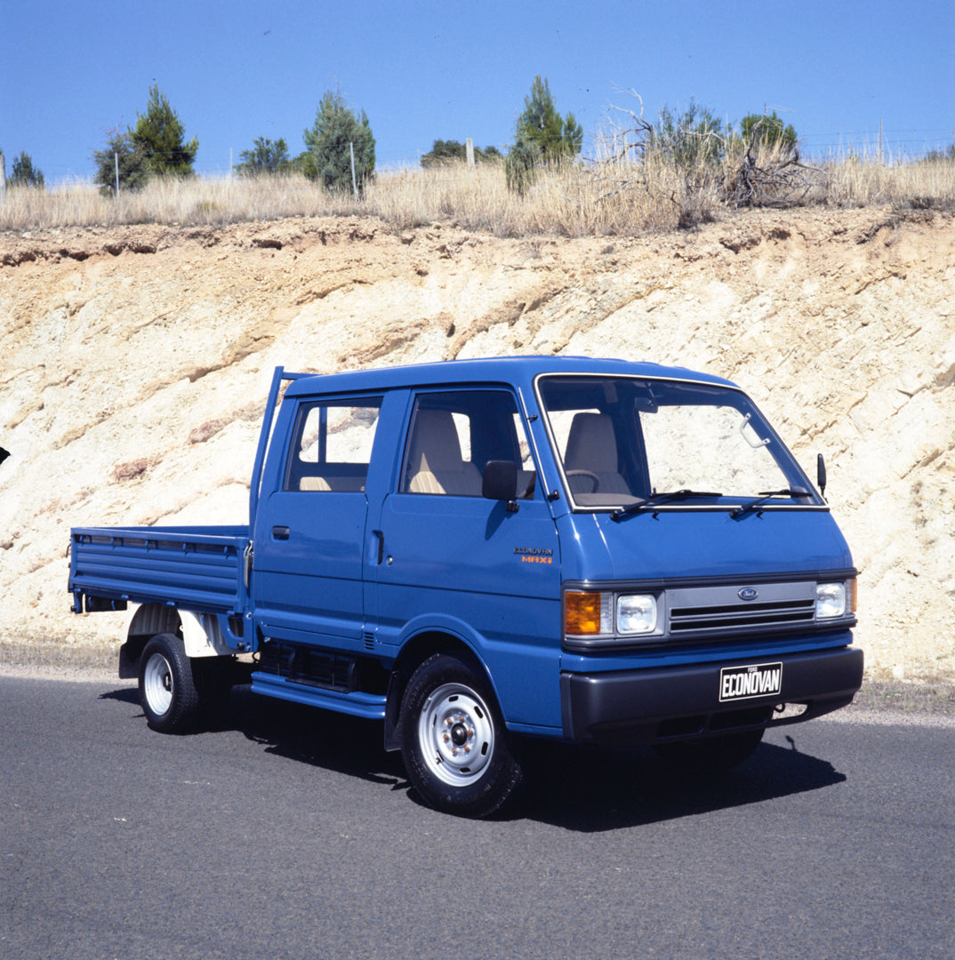 This archival image documents the 1984 Ford Econovan MAXi Crew Cab Truck Driver Side Front End View on Country Road FAP-2011-3 and is preserved in the Ford Heritage Vault as part of Ford Motor Company's historic photographic archive. Free for pers...