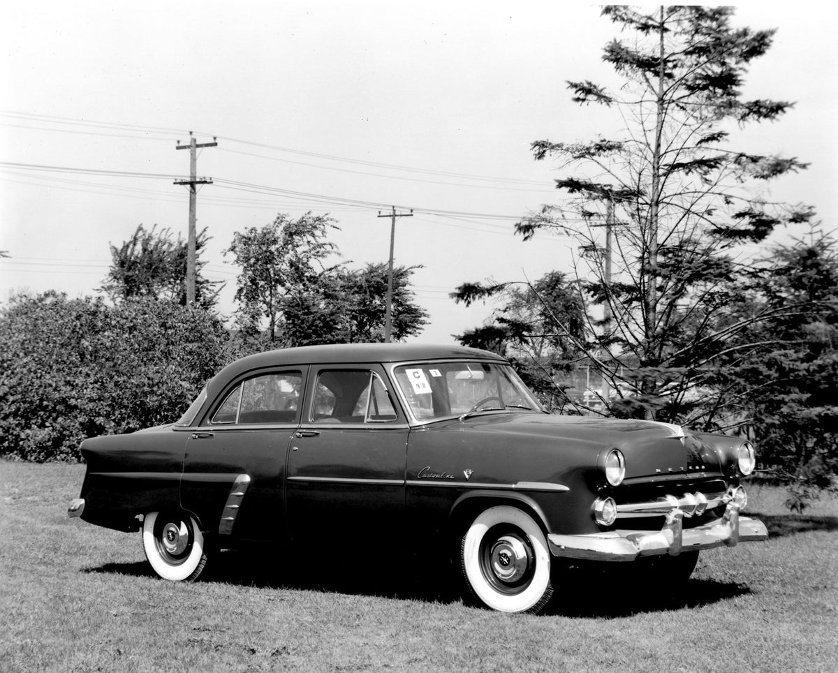 This archival image documents the 1952 Meteor Customline Sedan with scenic trees AR-2007-5 and is preserved in the Ford Heritage Vault as part of Ford Motor Company's historic photographic archive. Free for personal, non-commercial use. Ford Herit...