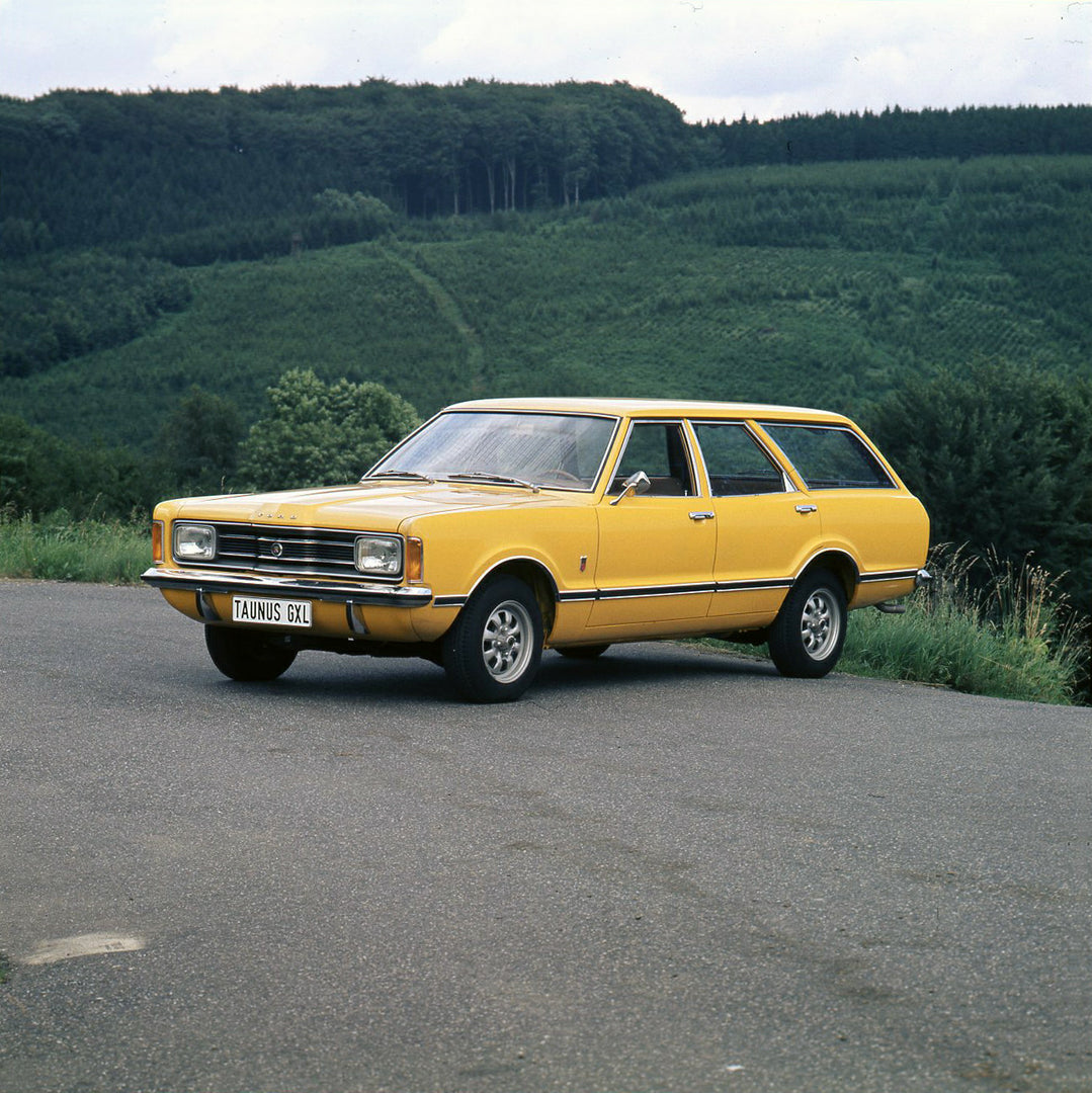 This archival image documents the 1974 Ford Taunus GXL on scenic road and is preserved in the Ford Heritage Vault as part of Ford Motor Company's historic photographic archive. Free for personal, non-commercial use. Ford Heritage Vault reference A...