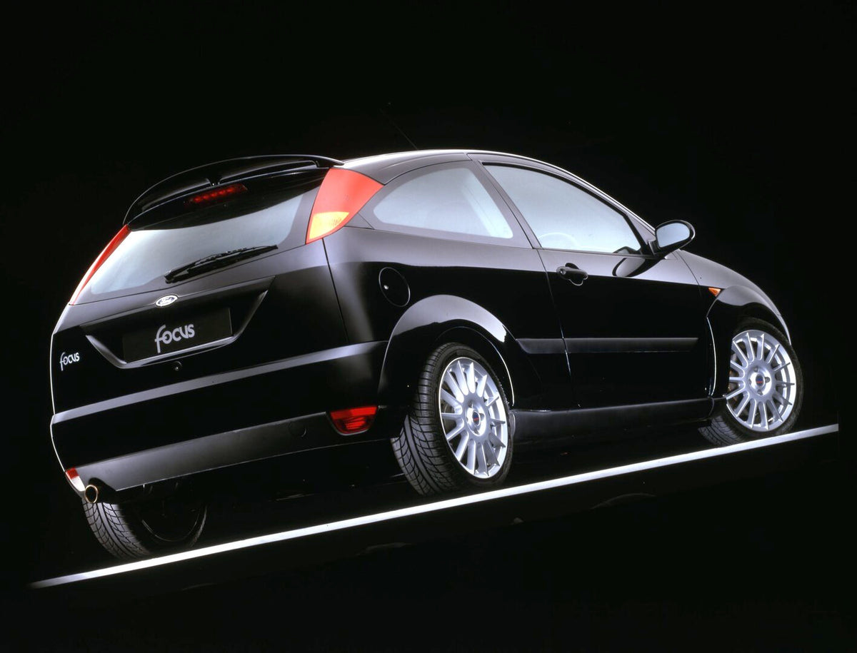 This archival image documents the 2001 Ford Focus Mark I rear view in studio and is preserved in the Ford Heritage Vault as part of Ford Motor Company's historic photographic archive. Free for personal, non-commercial use. Ford Heritage Vault refe...