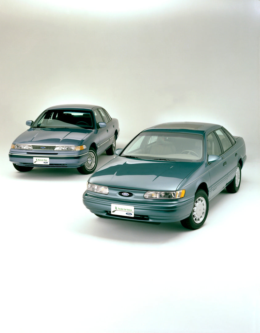 This archival image documents the 1993 Ford Crown Victoria natural gas and Taurus flex fuel and is preserved in the Ford Heritage Vault as part of Ford Motor Company's historic photographic archive. Free for personal, non-commercial use. Ford Heri...