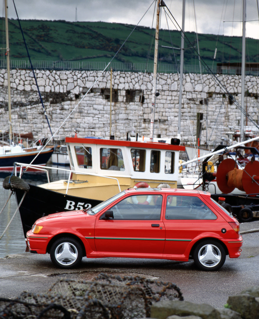 This archival image documents the 1990 Ford Fiesta Mark III Turbo side view in harbor in Northern Ireland and is preserved in the Ford Heritage Vault as part of Ford Motor Company's historic photographic archive. Free for personal, non-commercial ...