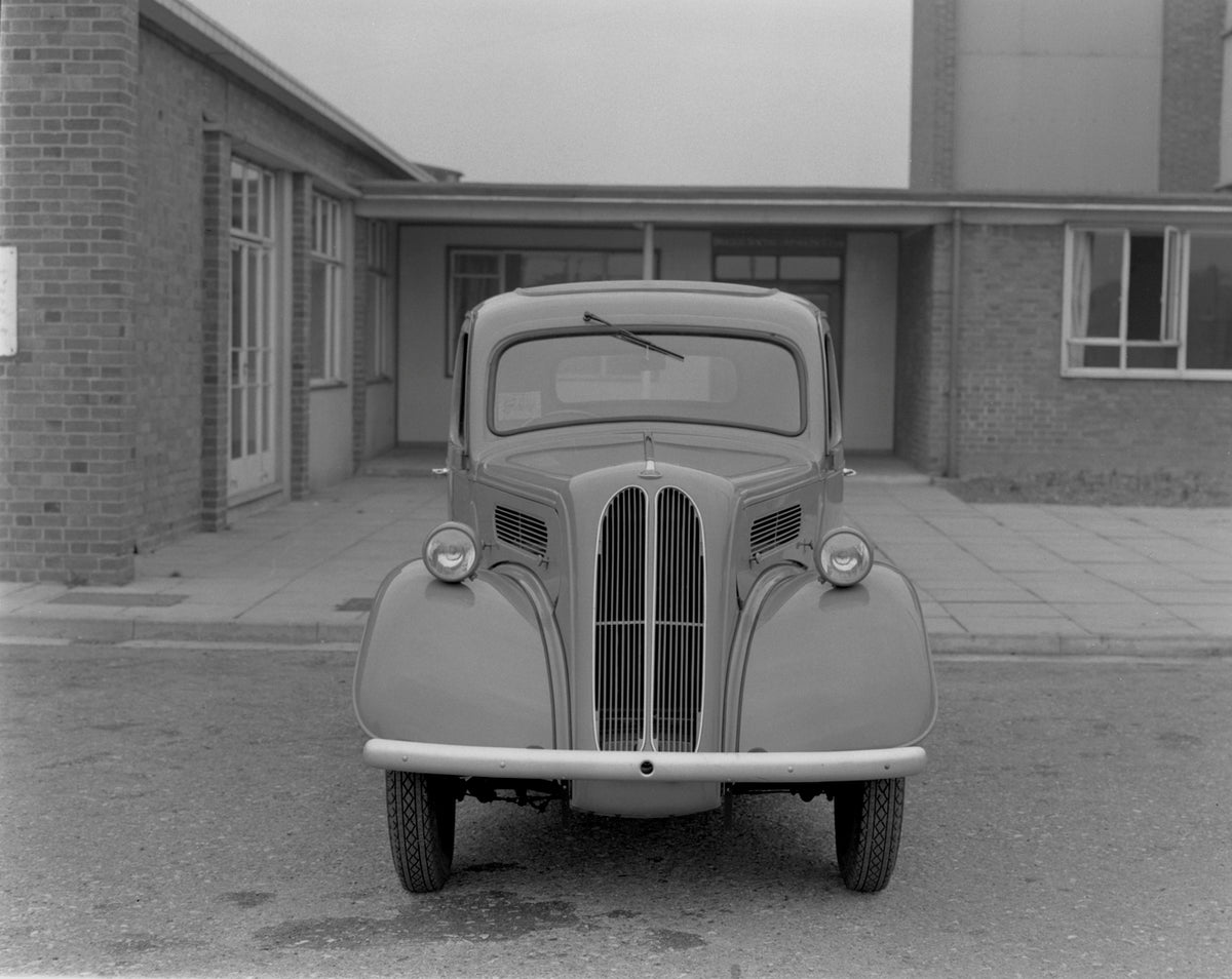 This archival image documents the 1957 Ford Popular at Briggs Sports Ground and is preserved in the Ford Heritage Vault as part of Ford Motor Company's historic photographic archive. Free for personal, non-commercial use. Ford Heritage Vault refer...