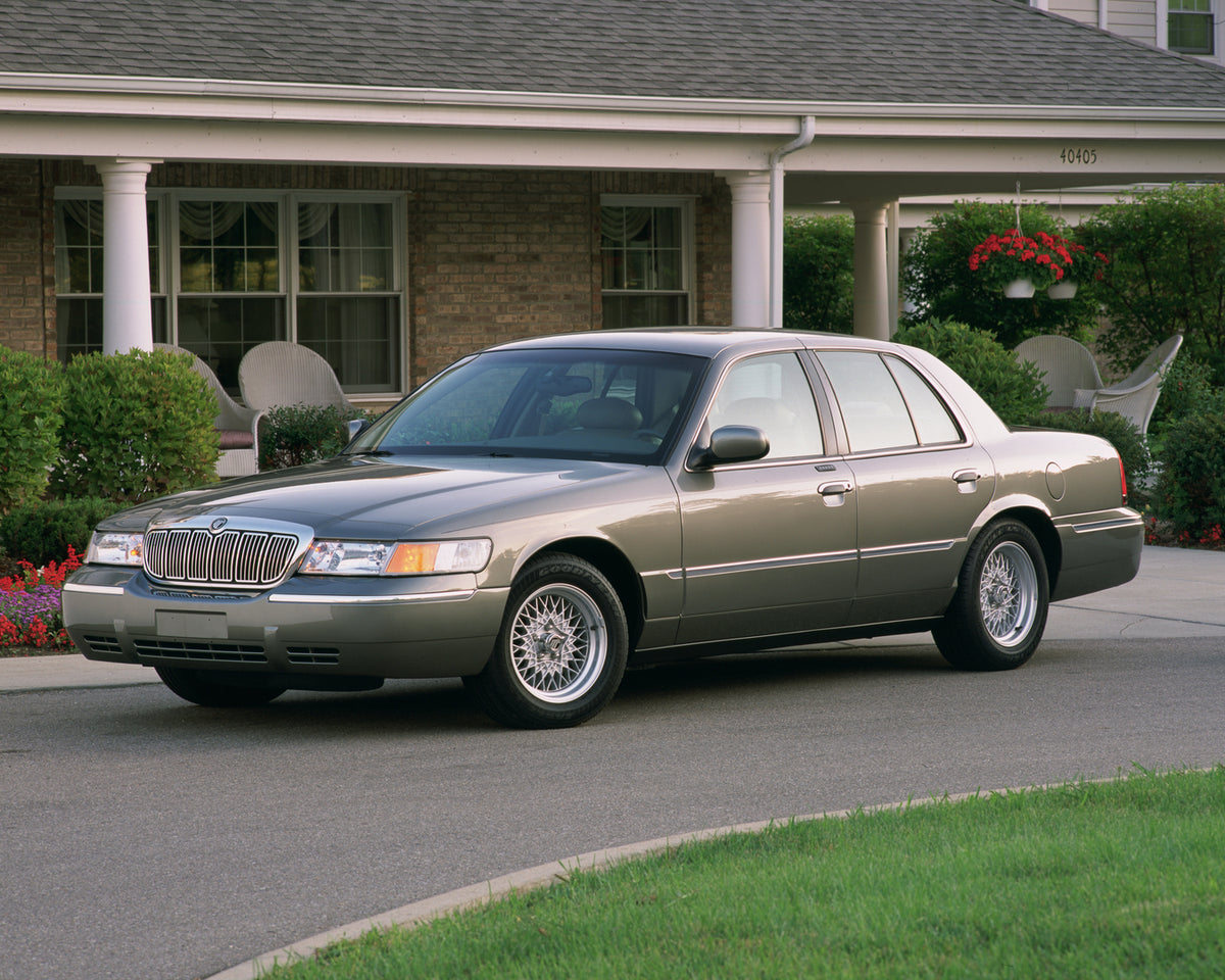 This archival image documents the 2002 Mercury Grand Marquis In Front Of A Home and is preserved in the Ford Heritage Vault as part of Ford Motor Company's historic photographic archive. Free for personal, non-commercial use. Ford Heritage Vault r...