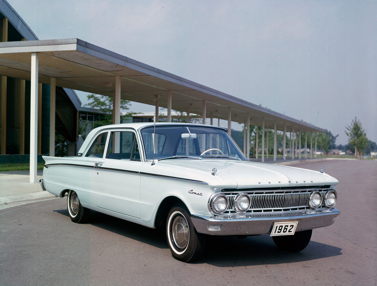 This archival image documents the 1962 Mercury Comet two-door sedan Motel and is preserved in the Ford Heritage Vault as part of Ford Motor Company's historic photographic archive. Free for personal, non-commercial use. Ford Heritage Vault referen...
