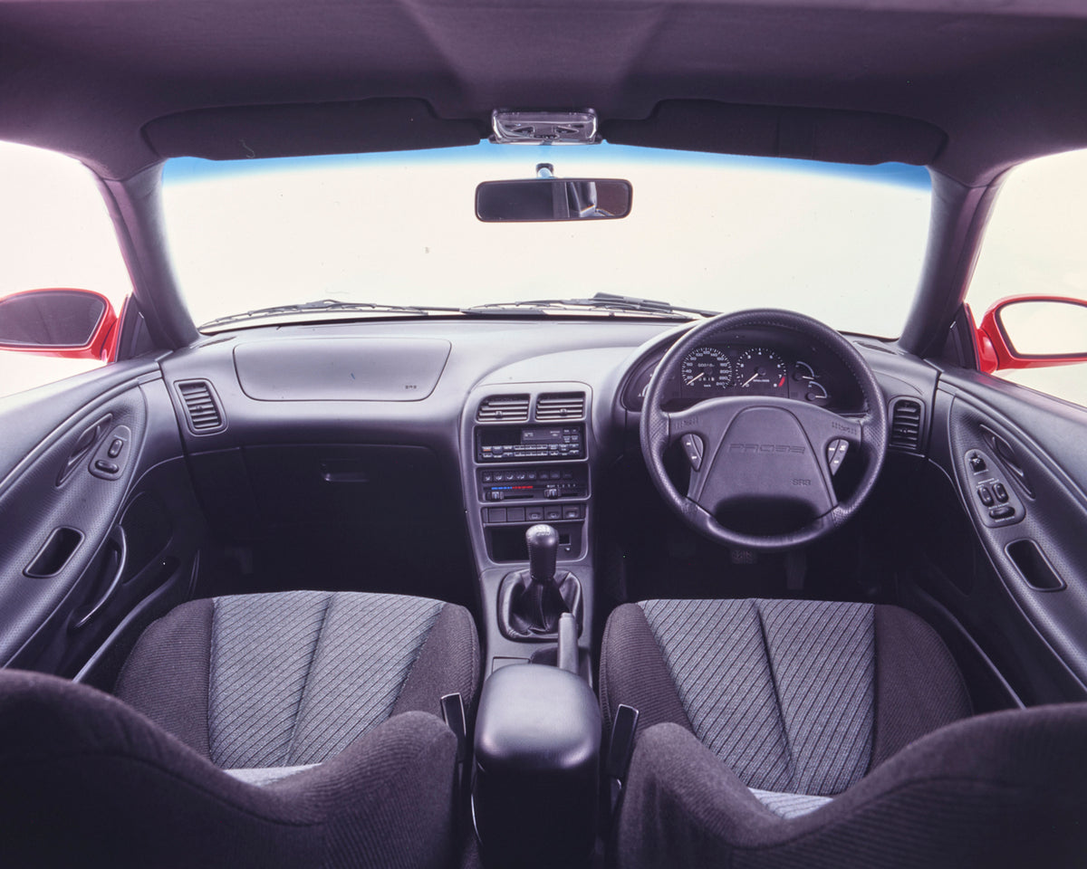 This archival image documents the 1994 Ford Probe Full Dash Console Interior View FAP-2011-3 and is preserved in the Ford Heritage Vault as part of Ford Motor Company's historic photographic archive. Free for personal, non-commercial use. Ford Her...