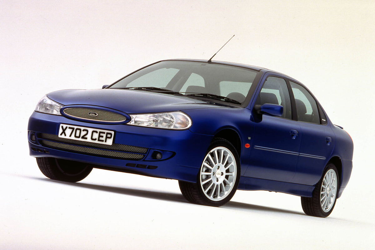 This archival image documents the 2000 Ford Mondeo ST200 in studio 2000-35-1 and is preserved in the Ford Heritage Vault as part of Ford Motor Company's historic photographic archive. Free for personal, non-commercial use. Ford Heritage Vault refe...