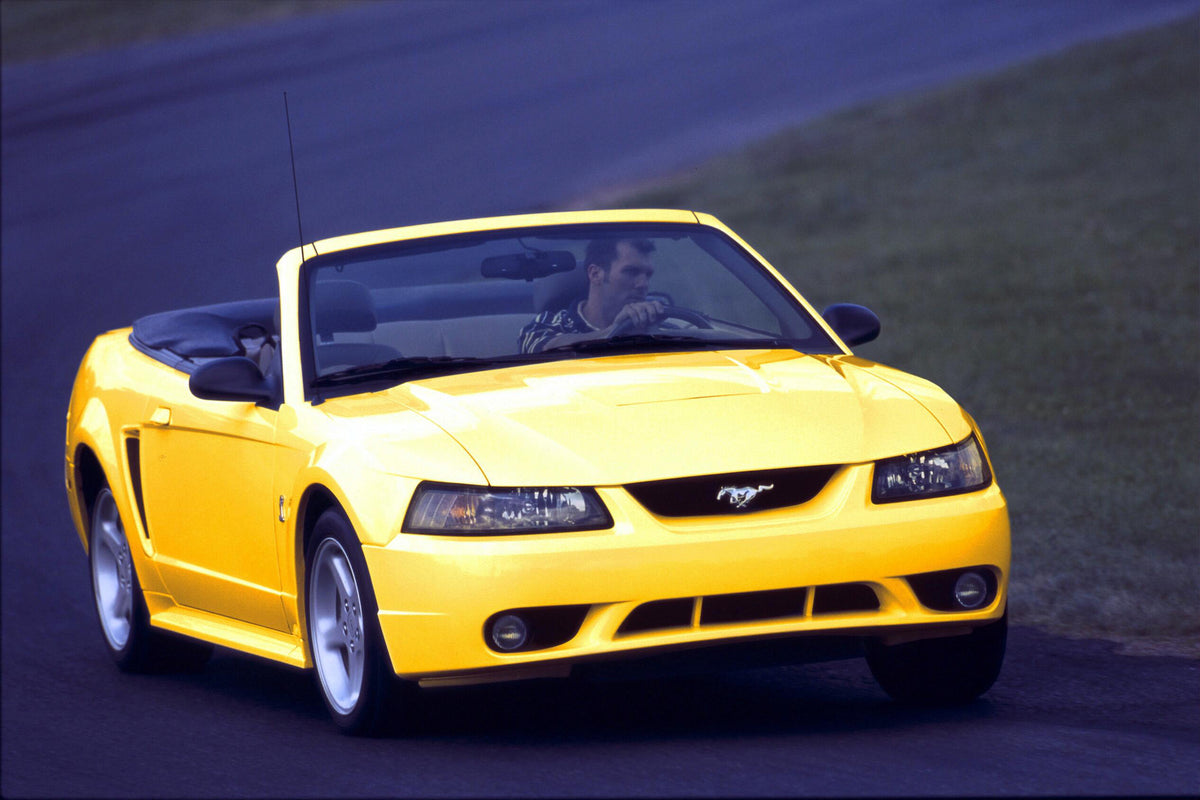 This archival image documents the 2001 Ford Mustang SVT cobra convertible and is preserved in the Ford Heritage Vault as part of Ford Motor Company's historic photographic archive. Free for personal, non-commercial use. Ford Heritage Vault referen...