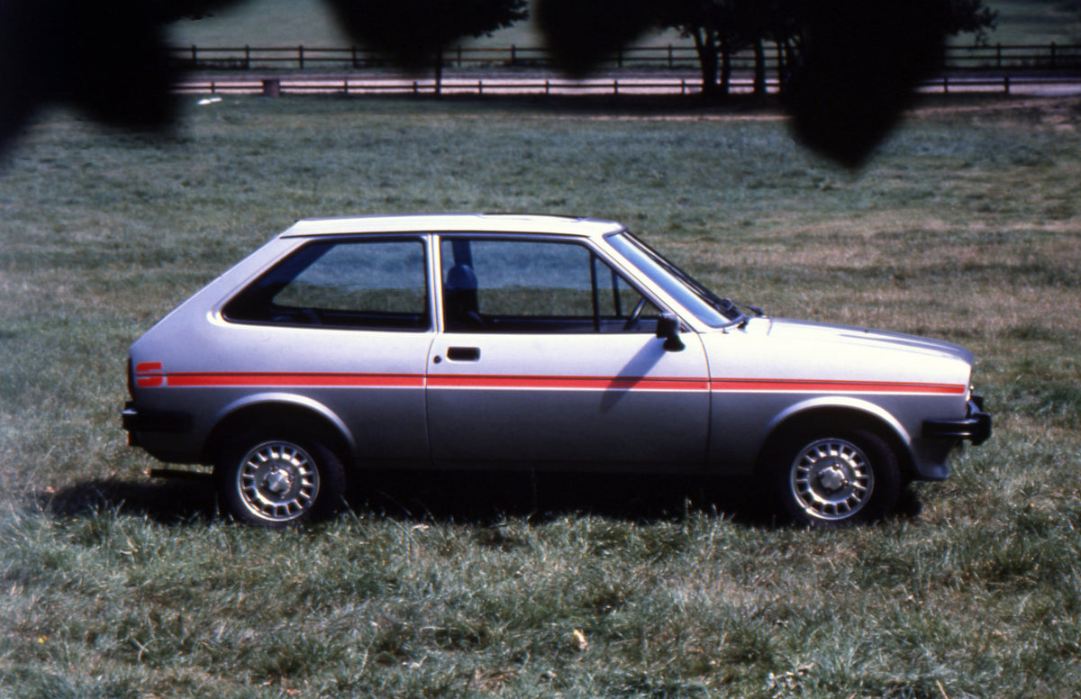 This archival image documents the 1979 Ford Fiesta Mark I S for Motor Show Update side view in scenic field and is preserved in the Ford Heritage Vault as part of Ford Motor Company's historic photographic archive. Free for personal, non-commercia...