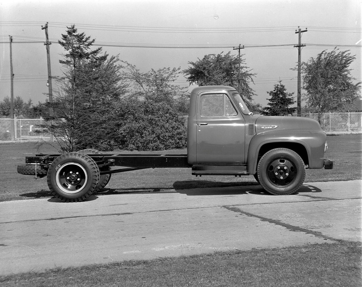 This archival image documents the 1953 Mercury M-500 Truck side view on scenic road AR-2007-5 and is preserved in the Ford Heritage Vault as part of Ford Motor Company's historic photographic archive. Free for personal, non-commercial use. Ford He...