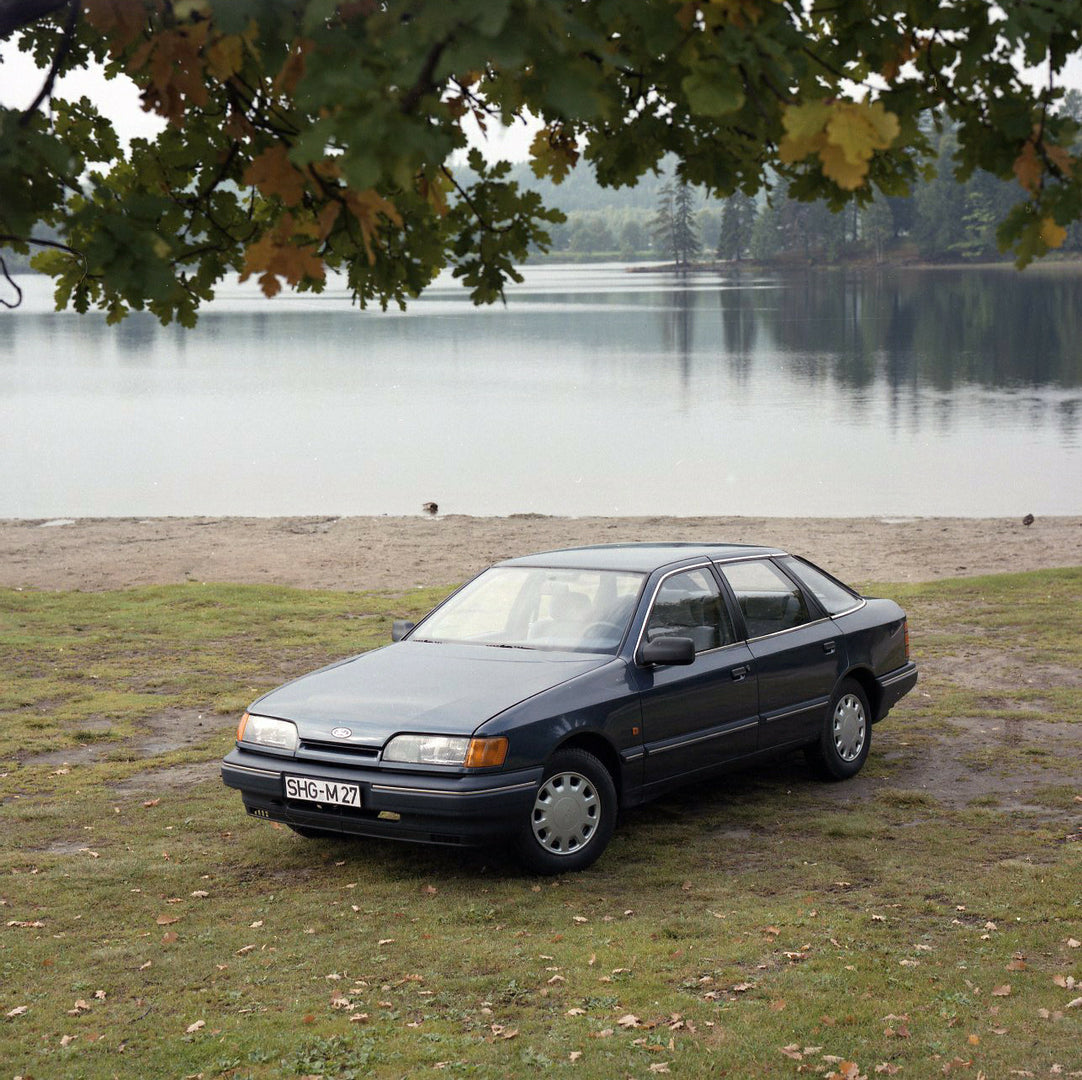This archival image documents the 1984 Ford Scorpio Mark I GL LHD near scenic lake in Norway and is preserved in the Ford Heritage Vault as part of Ford Motor Company's historic photographic archive. Free for personal, non-commercial use. Ford Her...