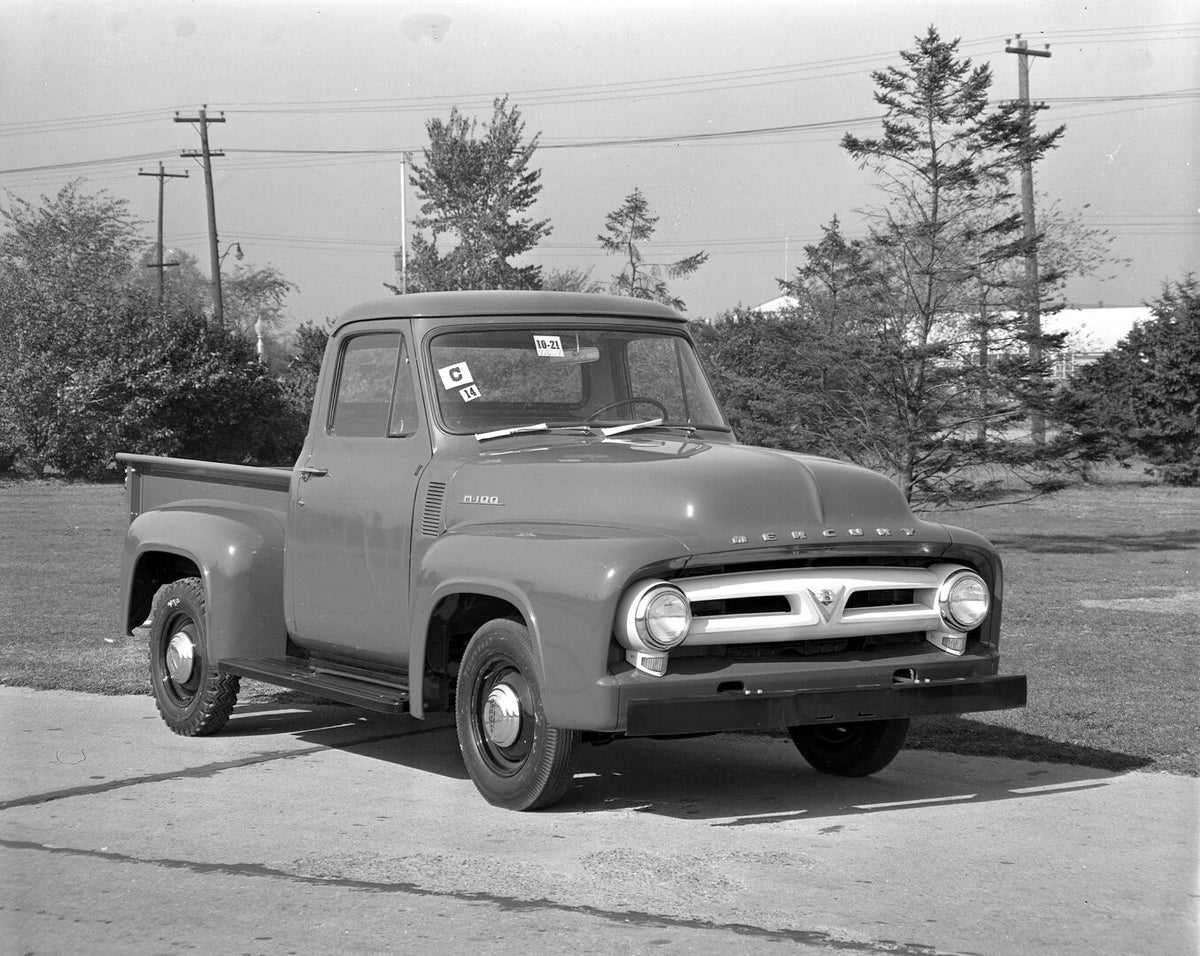 This archival image documents the 1953 Mercury M-100 Pickup on scenic road AR-2007-5 and is preserved in the Ford Heritage Vault as part of Ford Motor Company's historic photographic archive. Free for personal, non-commercial use. Ford Heritage Va...