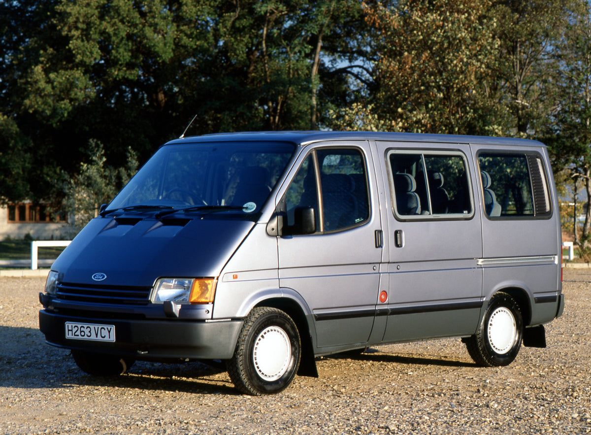 This archival image documents the 1990 Ford Transit Mark III Executive Bus in scenic parking lot with trees and is preserved in the Ford Heritage Vault as part of Ford Motor Company's historic photographic archive. Free for personal, non-commercia...