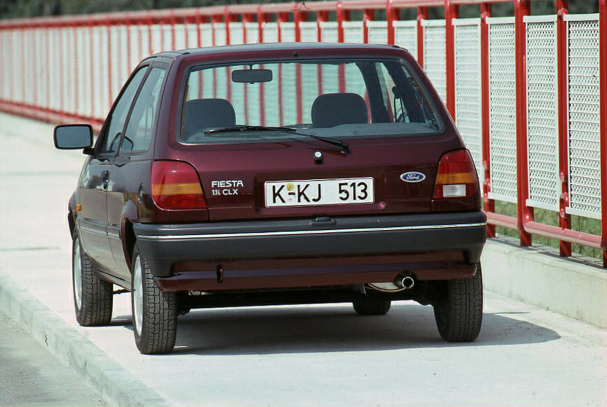 This archival image documents the 1988 Ford Fiesta Mark III 1.1L CLX LHD rear view on bridge and is preserved in the Ford Heritage Vault as part of Ford Motor Company's historic photographic archive. Free for personal, non-commercial use. Ford Her...