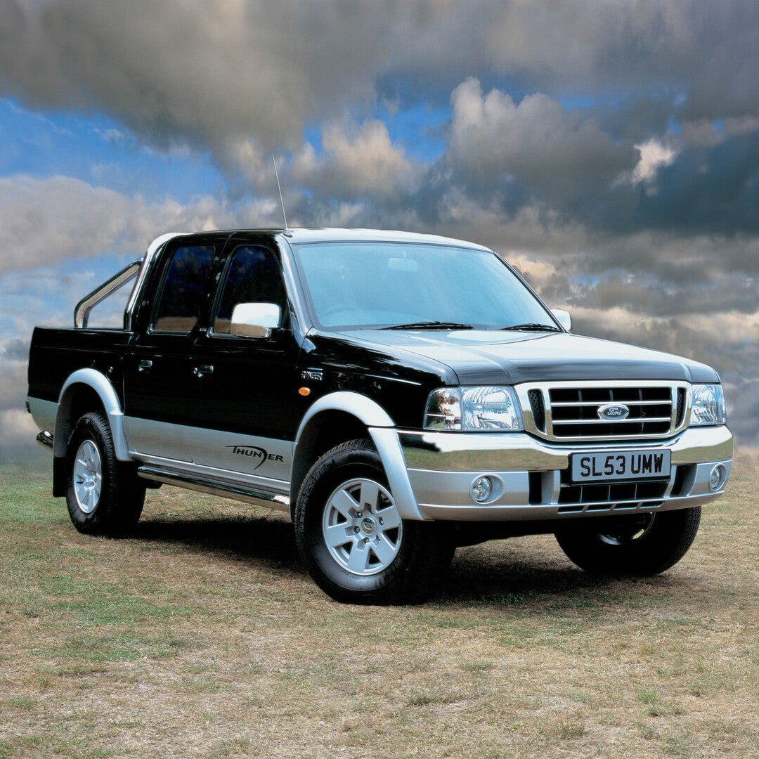This archival image documents the 2003 Ford Ranger Thunder with scenic cloudy sky and is preserved in the Ford Heritage Vault as part of Ford Motor Company's historic photographic archive. Free for personal, non-commercial use. Ford Heritage Vault...