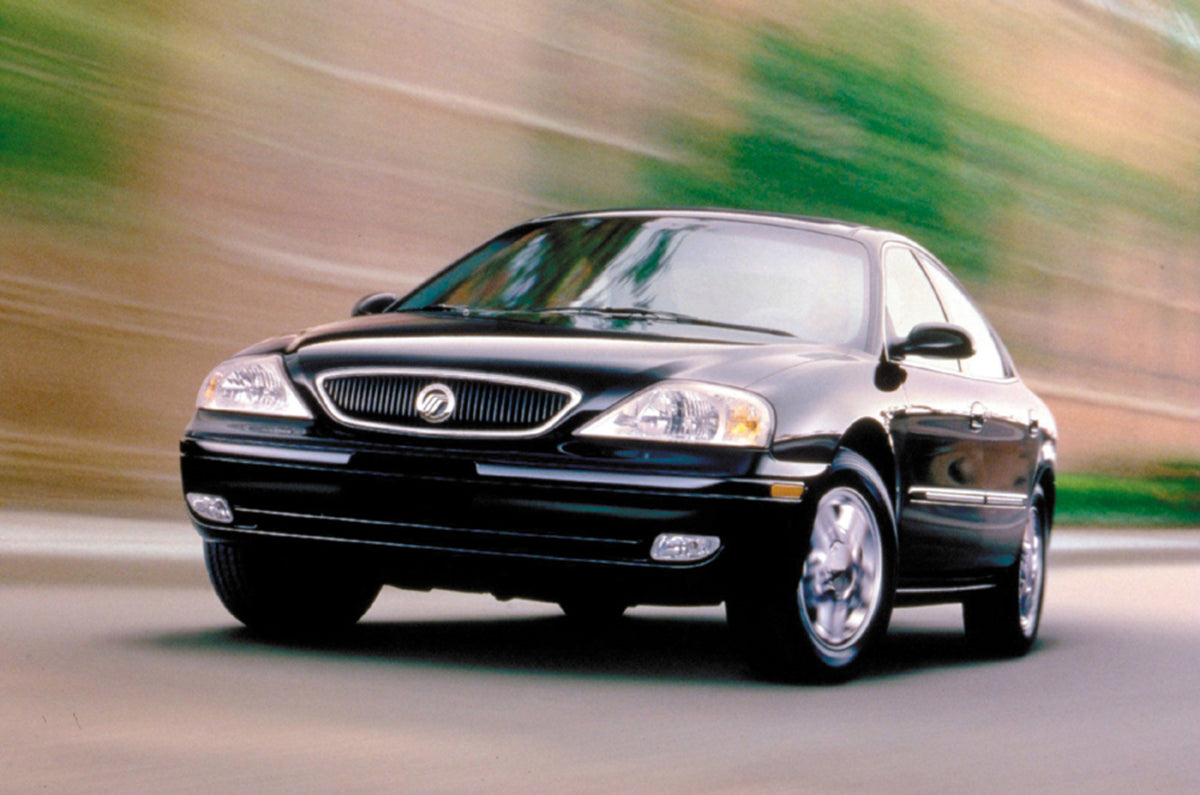 This archival image documents the 1999 Mercury Sable with Green and Brown Blurred Background and is preserved in the Ford Heritage Vault as part of Ford Motor Company's historic photographic archive. Free for personal, non-commercial use. Ford Her...