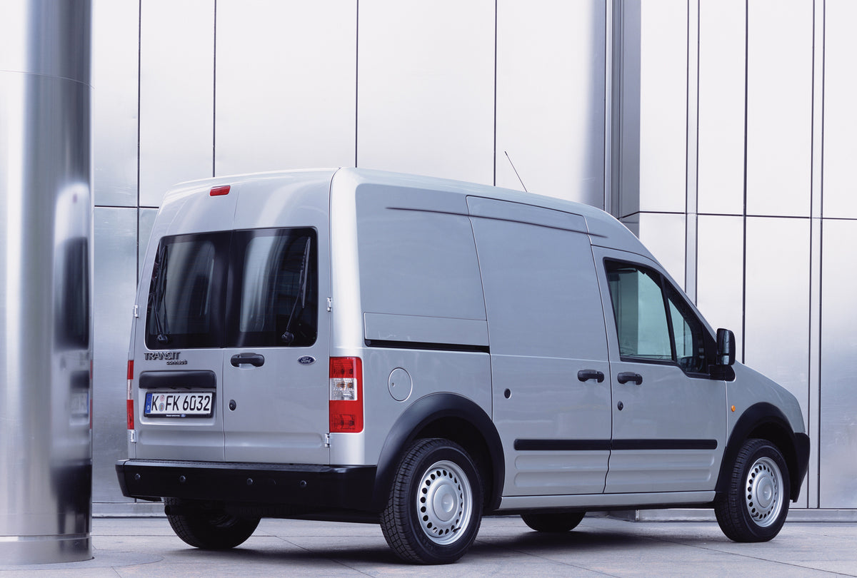 This archival image documents the 2002 Ford Transit Connect Long Wheelbase rear view in front of scenic wall and is preserved in the Ford Heritage Vault as part of Ford Motor Company's historic photographic archive. Free for personal, non-commerci...
