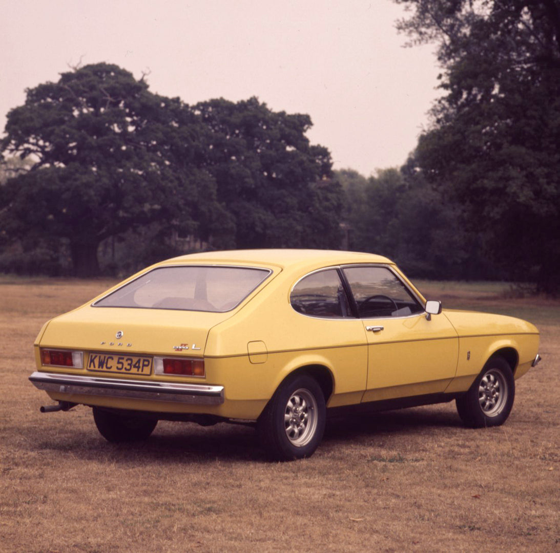 This archival image documents the 1975 Ford Capri MK II 1.3 L rear view in scenic field and is preserved in the Ford Heritage Vault as part of Ford Motor Company's historic photographic archive. Free for personal, non-commercial use. Ford Heritage...
