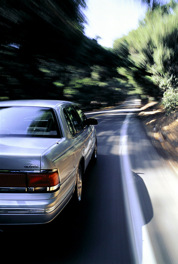 This archival image documents the 1992 Lincoln Continental four-door and is preserved in the Ford Heritage Vault as part of Ford Motor Company's historic photographic archive. Free for personal, non-commercial use. Ford Heritage Vault reference AR...