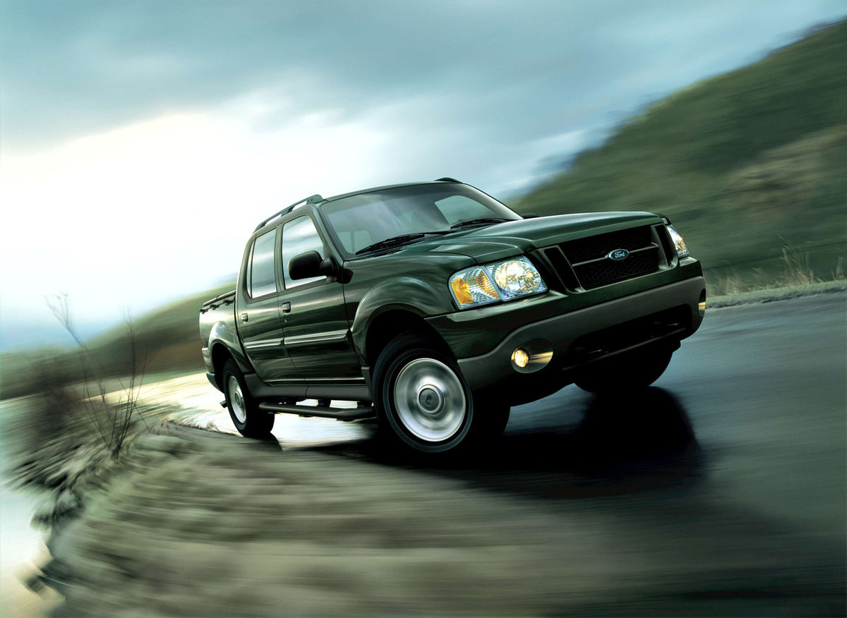 This archival image documents the 2003 Ford Explorer Sport Trac and is preserved in the Ford Heritage Vault as part of Ford Motor Company's historic photographic archive. Free for personal, non-commercial use. Ford Heritage Vault reference AR-2008...