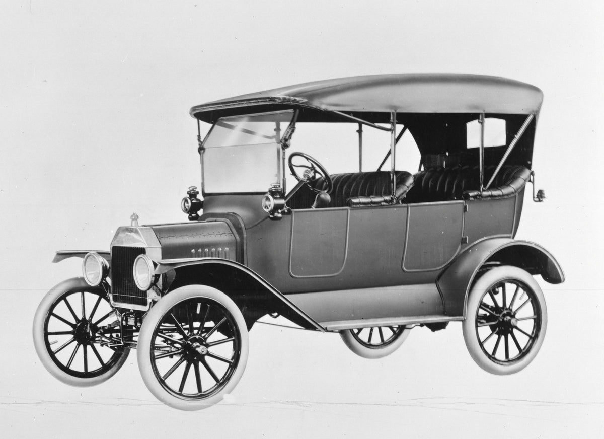 This archival image documents the 1914 Ford Model T and is preserved in the Ford Heritage Vault as part of Ford Motor Company's historic photographic archive. Free for personal, non-commercial use. Ford Heritage Vault reference AR-2008-8.1.4.115.
