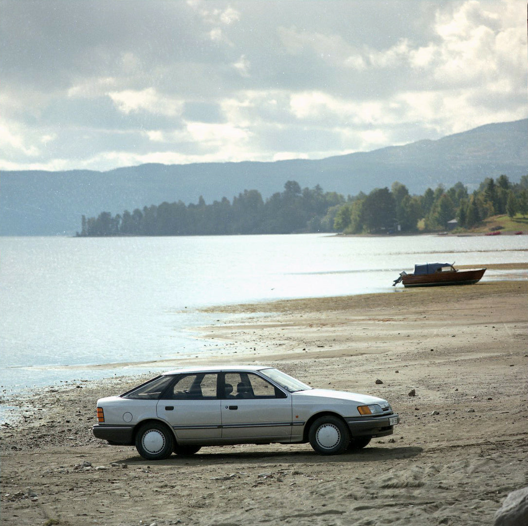This archival image documents the 1984 Ford Scorpio Mark I CL side view on scenic beach in Norway and is preserved in the Ford Heritage Vault as part of Ford Motor Company's historic photographic archive. Free for personal, non-commercial use. For...