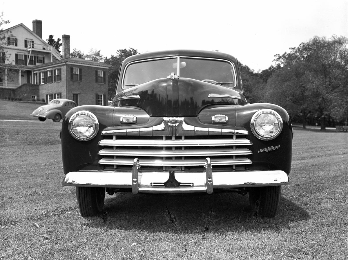 This archival image documents the 1946 Ford Super DeLuxe four-door sedan scenic and is preserved in the Ford Heritage Vault as part of Ford Motor Company's historic photographic archive. Free for personal, non-commercial use. Ford Heritage Vault r...