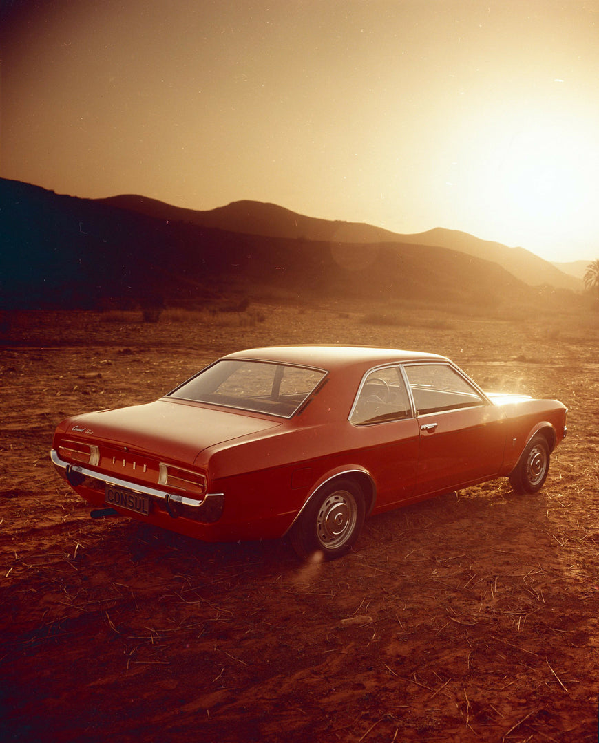 This archival image documents the 1974 Ford Consul LHD rear view in scenic desert with sunset and is preserved in the Ford Heritage Vault as part of Ford Motor Company's historic photographic archive. Free for personal, non-commercial use. Ford He...