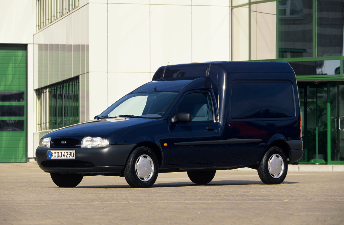 This archival image documents the 1996 Ford Fiesta Mark IV Van in front of building and is preserved in the Ford Heritage Vault as part of Ford Motor Company's historic photographic archive. Free for personal, non-commercial use. Ford Heritage Vau...