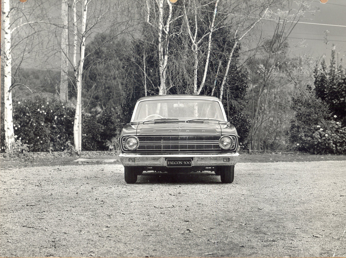 This archival image documents the 1966 Ford XR Falcon 500 front view with scenic trees and is preserved in the Ford Heritage Vault as part of Ford Motor Company's historic photographic archive. Free for personal, non-commercial use. Ford Heritage ...