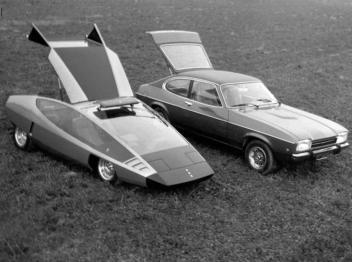 This archival image documents the 1974 Ghia Coins and Ford Capri II side by side with open hatches AR-2002-213717-13 and is preserved in the Ford Heritage Vault as part of Ford Motor Company's historic photographic archive. Free for personal, non-...