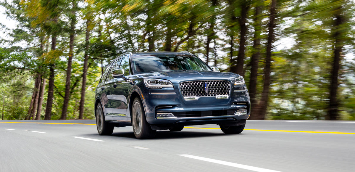 This archival image documents the 2020 Lincoln Aviator Grand Touring action shot on scenic road and is preserved in the Ford Heritage Vault as part of Ford Motor Company's historic photographic archive. Free for personal, non-commercial use. Ford ...