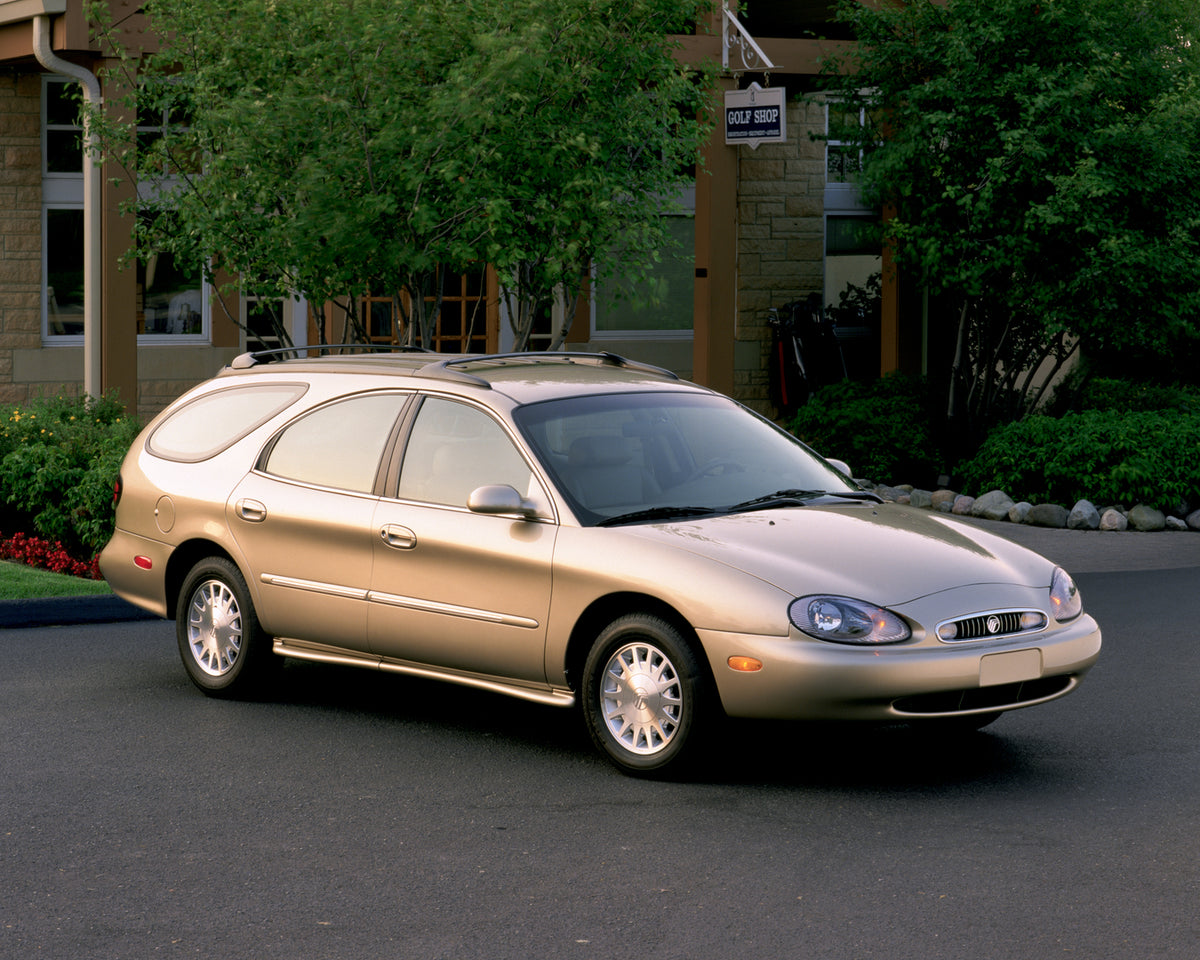 This archival image documents the 1999 Mercury Sable LS station wagon Golf Shop and is preserved in the Ford Heritage Vault as part of Ford Motor Company's historic photographic archive. Free for personal, non-commercial use. Ford Heritage Vault r...