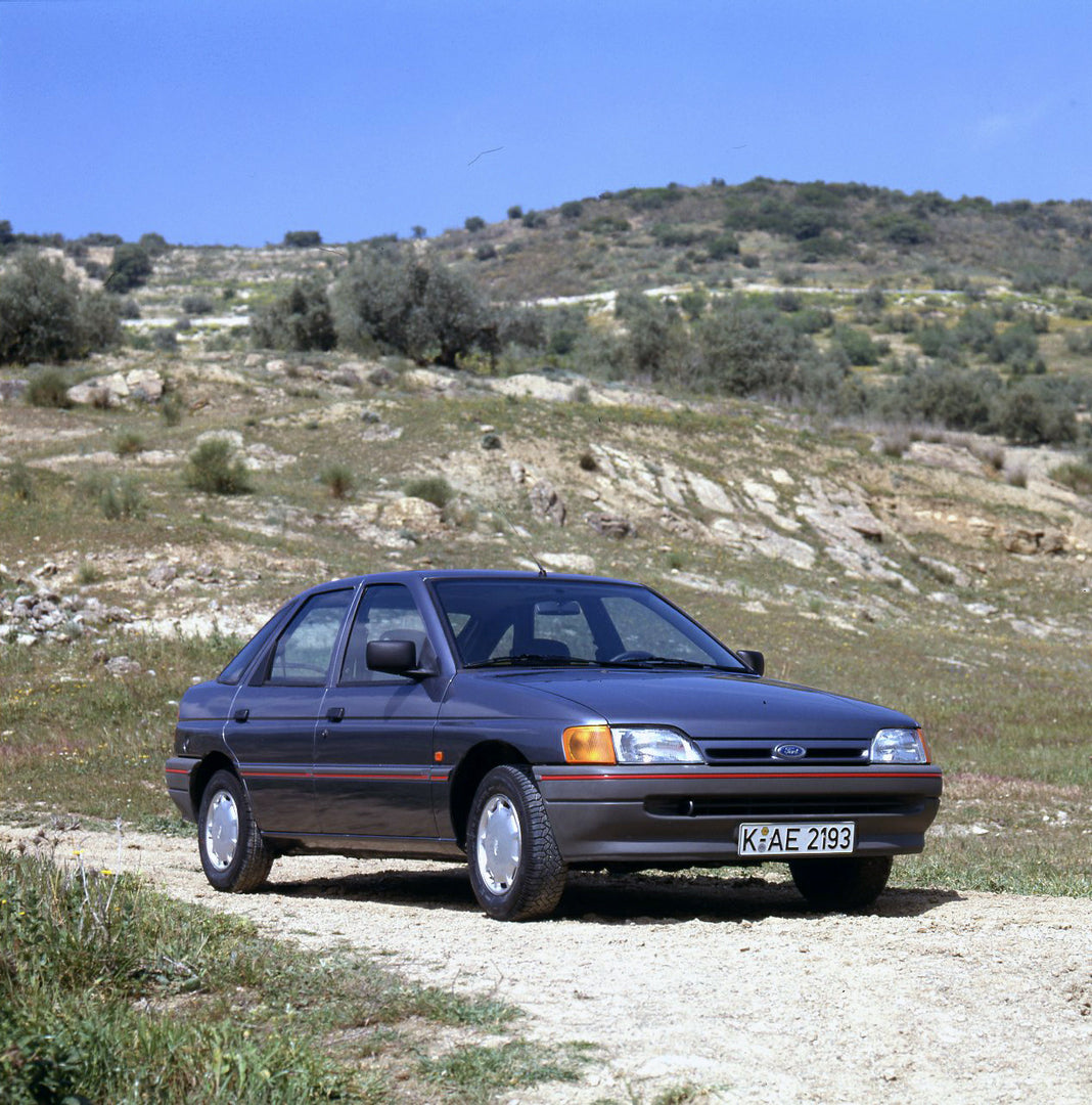 This archival image documents the 1990 Ford Escort CE-14 LHD on road in Spain and is preserved in the Ford Heritage Vault as part of Ford Motor Company's historic photographic archive. Free for personal, non-commercial use. Ford Heritage Vault ref...
