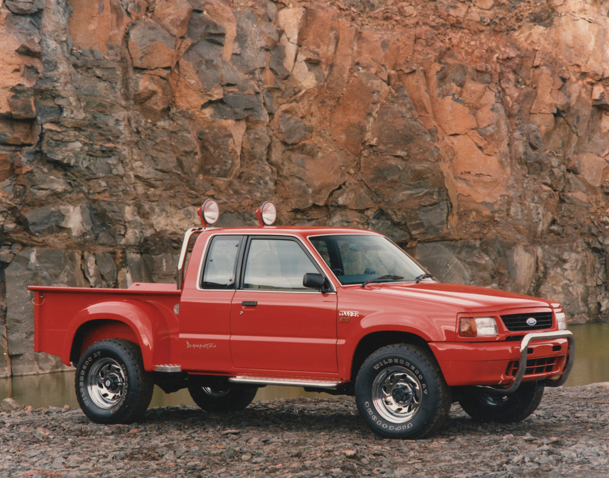 This archival image documents the 1998 Ford Diamantina Courier Driver Side Front End View by the River FAP-2011-3 and is preserved in the Ford Heritage Vault as part of Ford Motor Company's historic photographic archive. Free for personal, non-com...