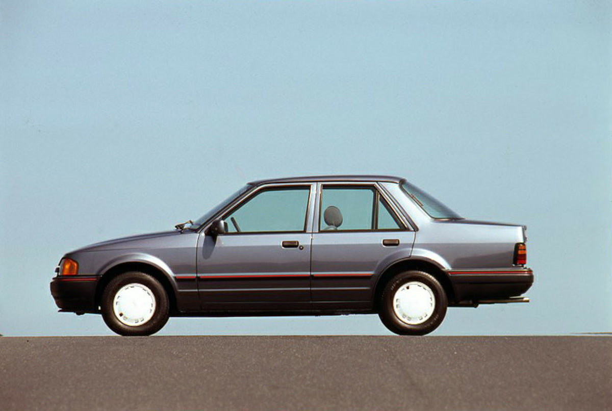 This archival image documents the 1989 Ford Orion Mark II LHD side view with scenic blue sky and is preserved in the Ford Heritage Vault as part of Ford Motor Company's historic photographic archive. Free for personal, non-commercial use. Ford Her...