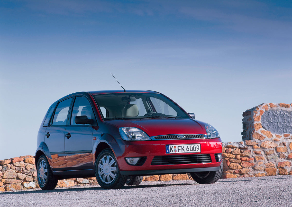 This archival image documents the 2001 Ford Fiesta Mark V low view with scenic rock wall and is preserved in the Ford Heritage Vault as part of Ford Motor Company's historic photographic archive. Free for personal, non-commercial use. Ford Heritag...