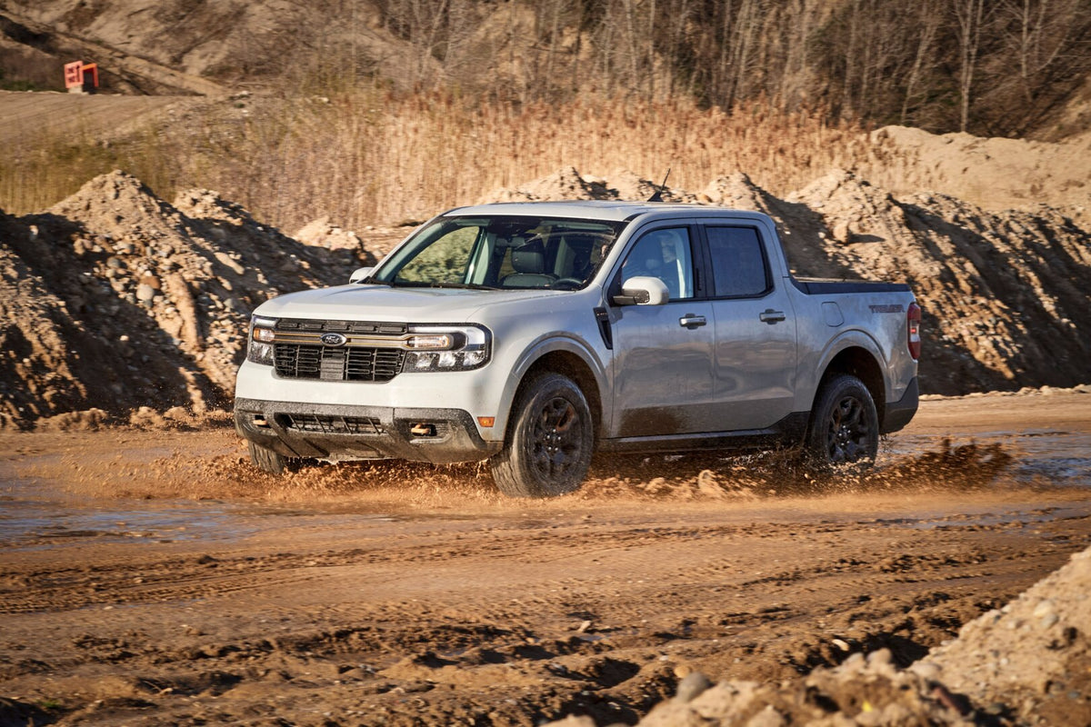 This archival image documents the 2023 Ford Maverick Tremor action shot on dirt road and is preserved in the Ford Heritage Vault as part of Ford Motor Company's historic photographic archive. Free for personal, non-commercial use. Ford Heritage Va...