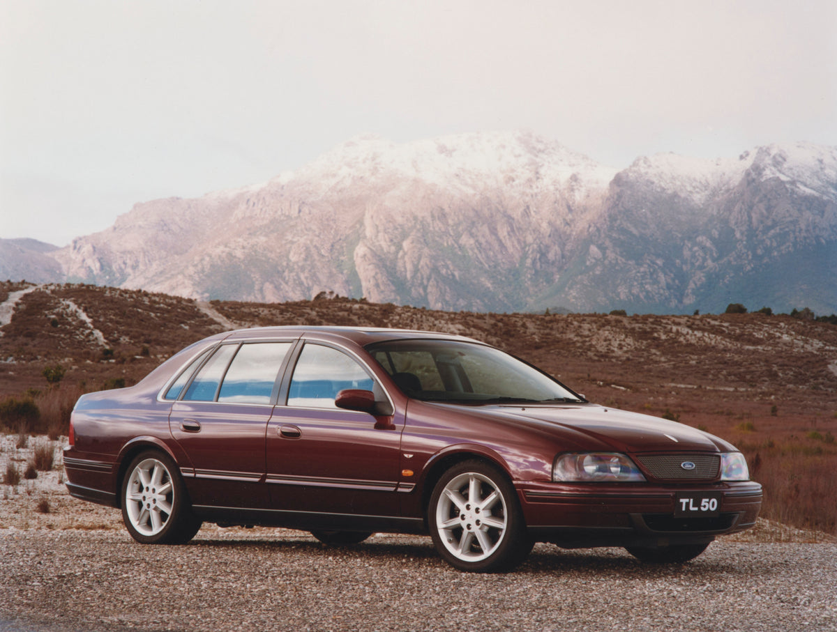 This archival image documents the 1999 Ford AU II Falcon TL50 Sedan 3/4 Front View in Front of a Mountain Range FAP 2011-3 and is preserved in the Ford Heritage Vault as part of Ford Motor Company's historic photographic archive. Free for personal...