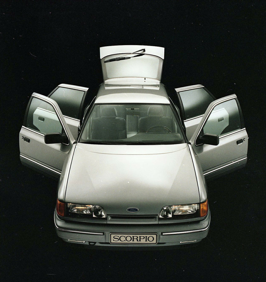 This archival image documents the 1985 Ford Scorpio Mark I front view in studio with open doors and is preserved in the Ford Heritage Vault as part of Ford Motor Company's historic photographic archive. Free for personal, non-commercial use. Ford ...