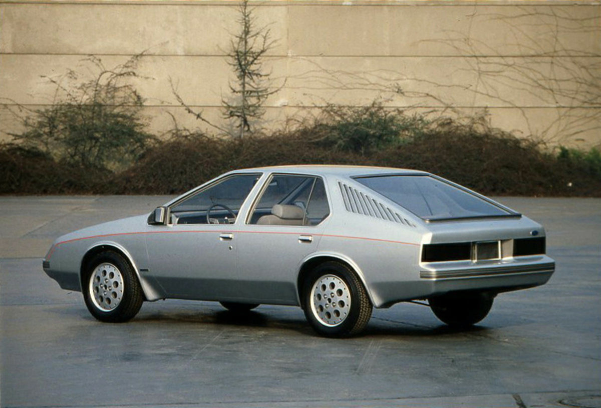 This archival image documents the 1980 Ford Probe II side angled view in parking lot and is preserved in the Ford Heritage Vault as part of Ford Motor Company's historic photographic archive. Free for personal, non-commercial use. Ford Heritage Va...