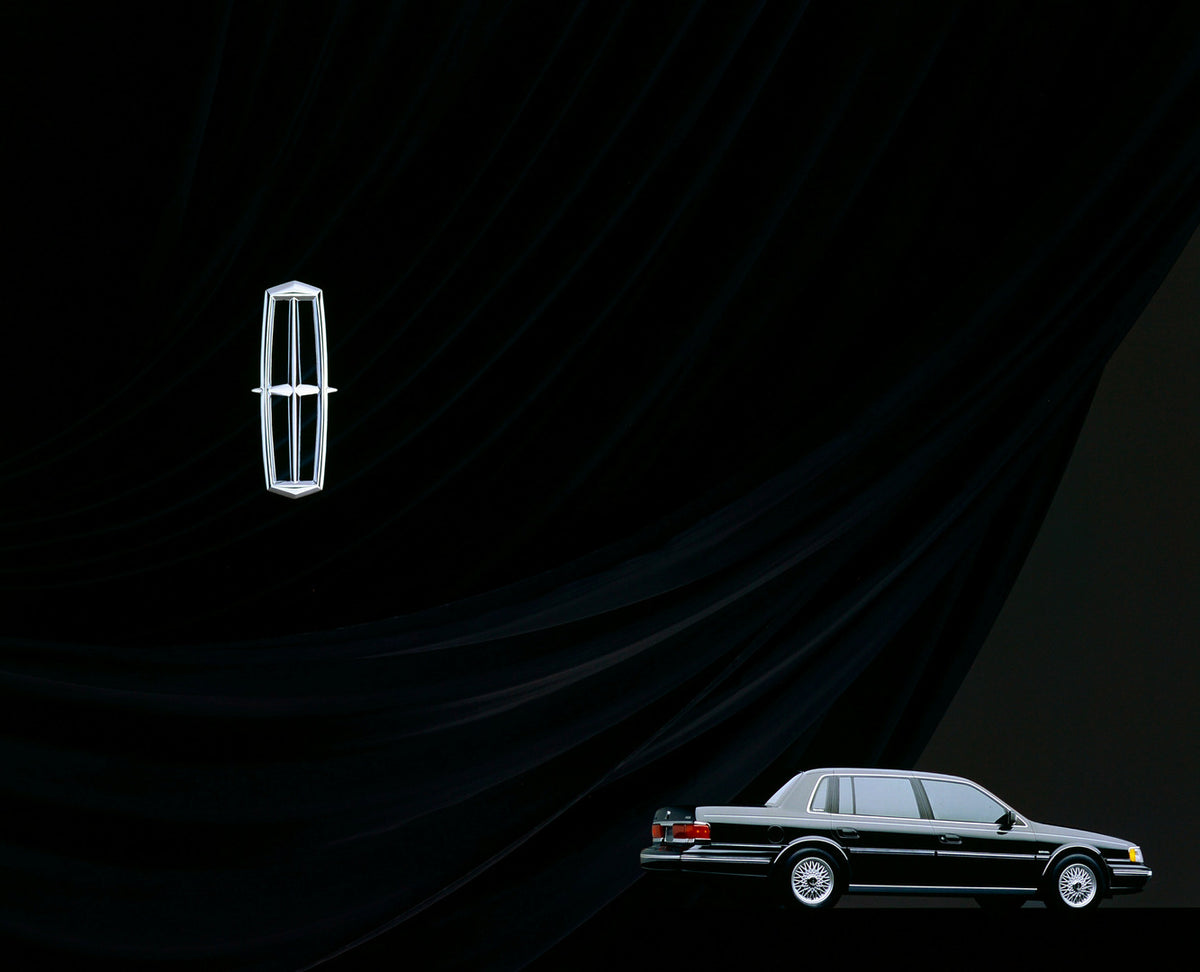 This archival image documents the 1990 Lincoln Continental four-door and is preserved in the Ford Heritage Vault as part of Ford Motor Company's historic photographic archive. Free for personal, non-commercial use. Ford Heritage Vault reference AR...