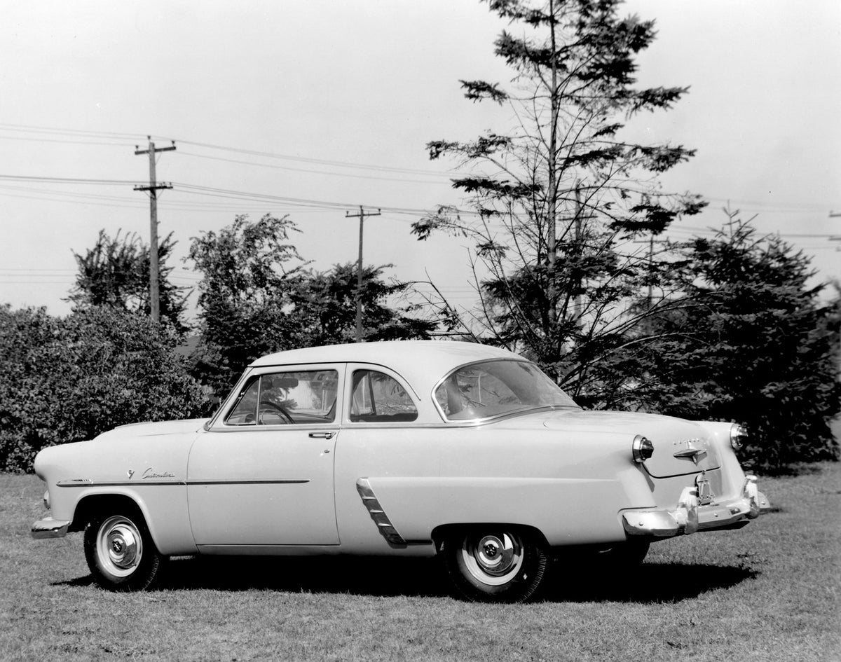 This archival image documents the 1952 Meteor Customline Coupe rear view with scenic trees AR-2007-5 and is preserved in the Ford Heritage Vault as part of Ford Motor Company's historic photographic archive. Free for personal, non-commercial use. ...
